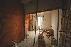 Room opened up to the framing during water damage repairs